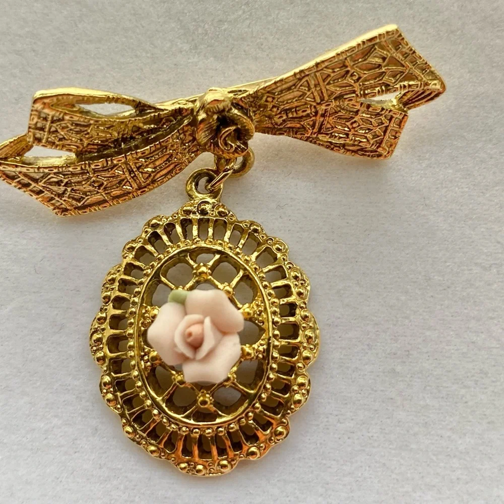 Vintage Goldtone Ribbon Bow with Porcelain Pink Rose Brooch